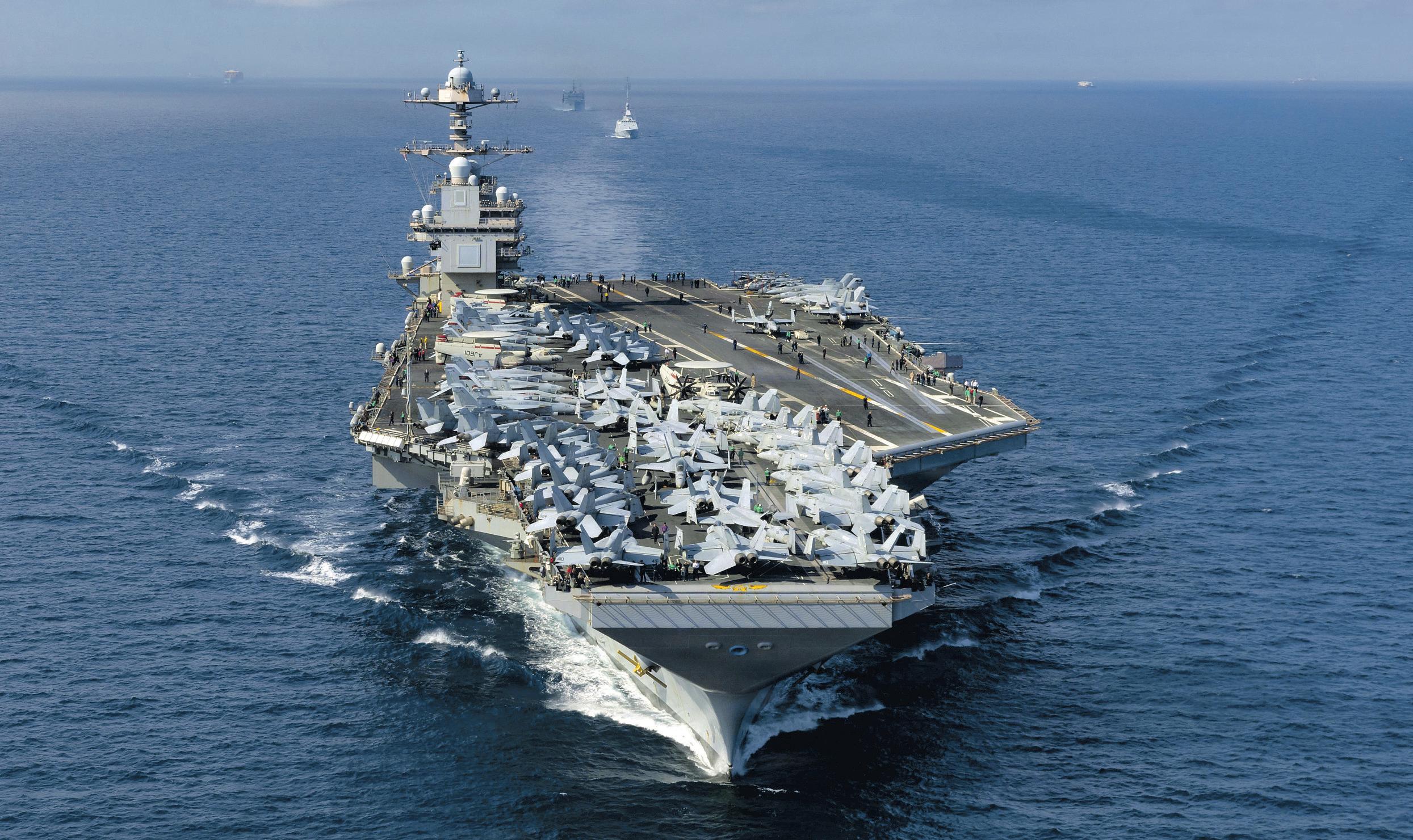 Hulking U.S. aircraft carrier arrives in Caribbean