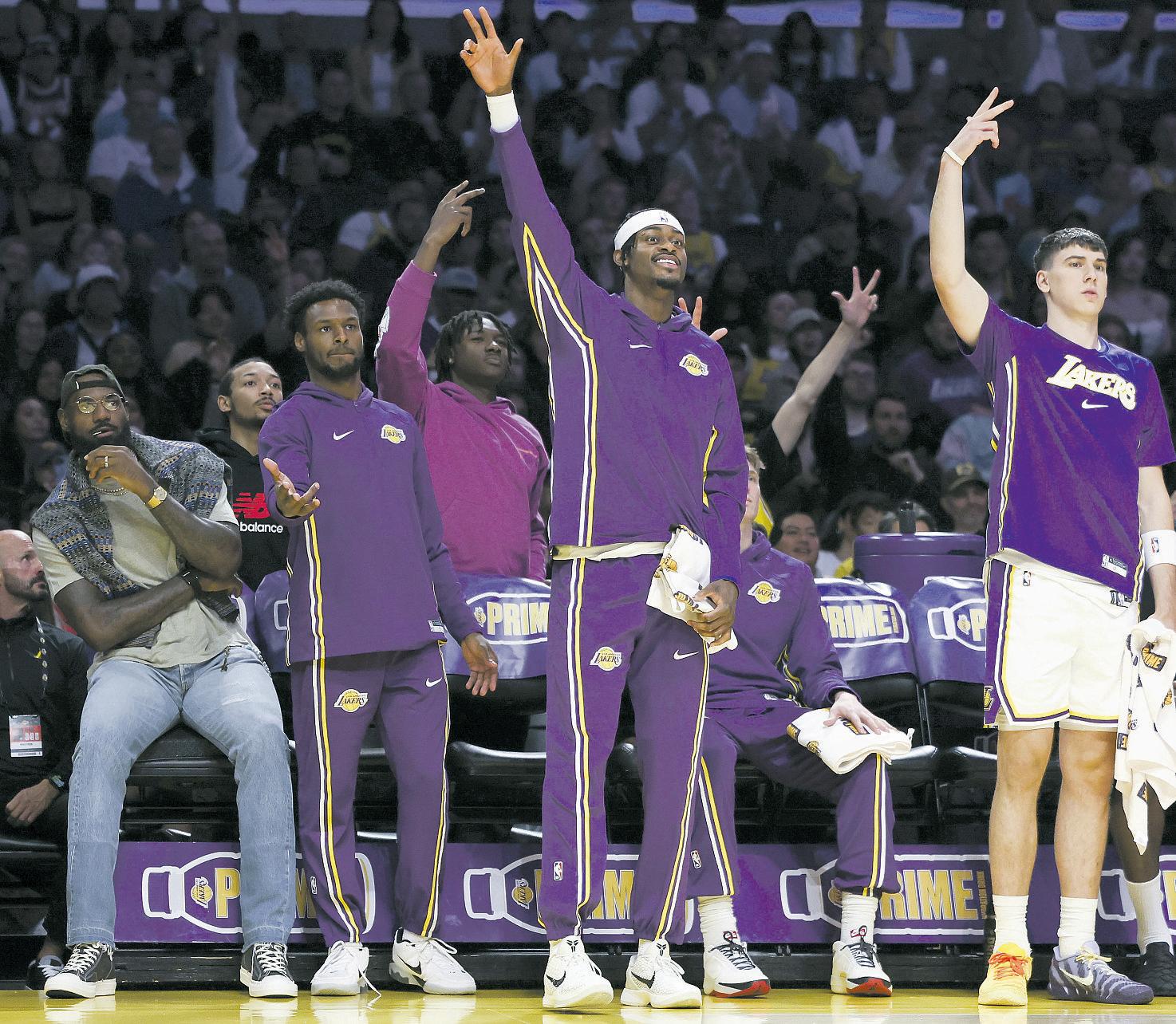 Lakers adjust while getting lift from James