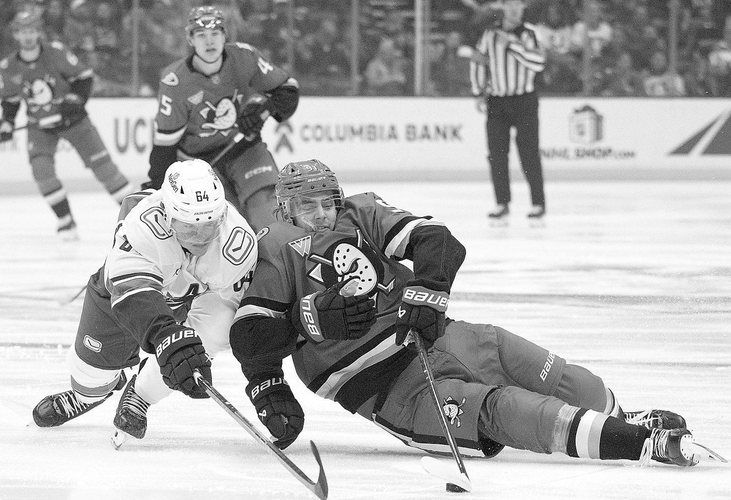 Late goals sink Ducks against the Canucks