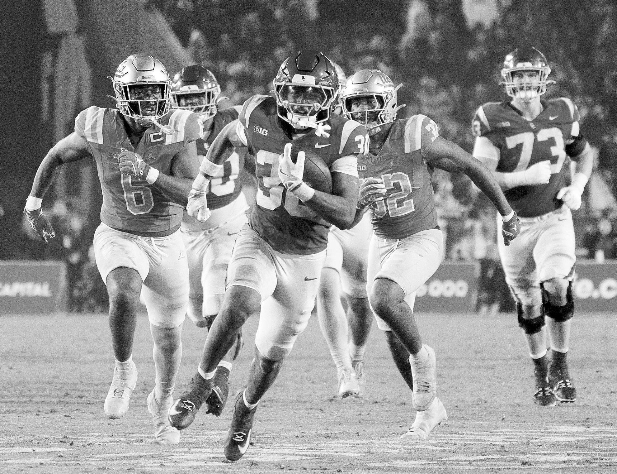 High marks for Trojans ... but also help wanted