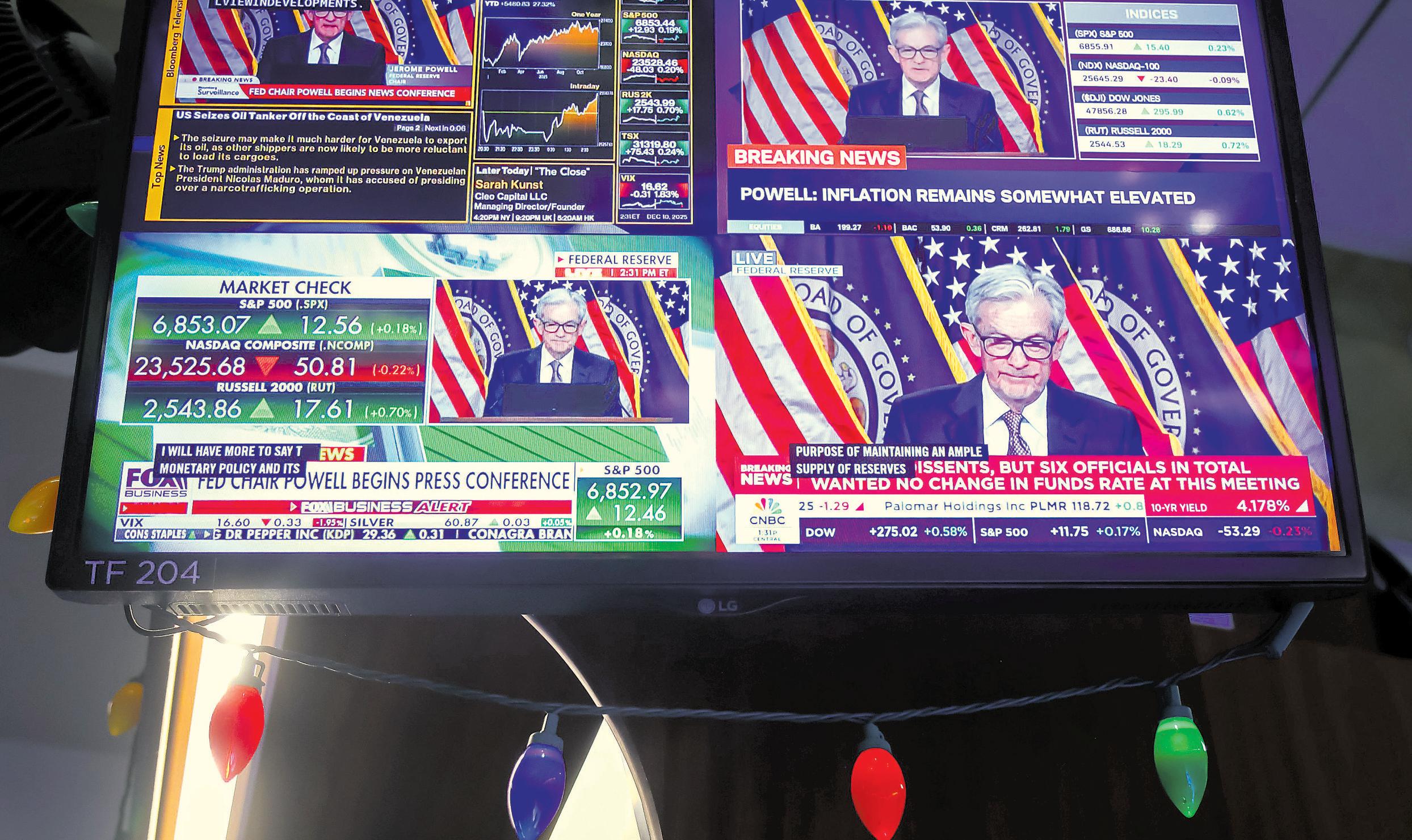 Fed cuts rate but signals restraint