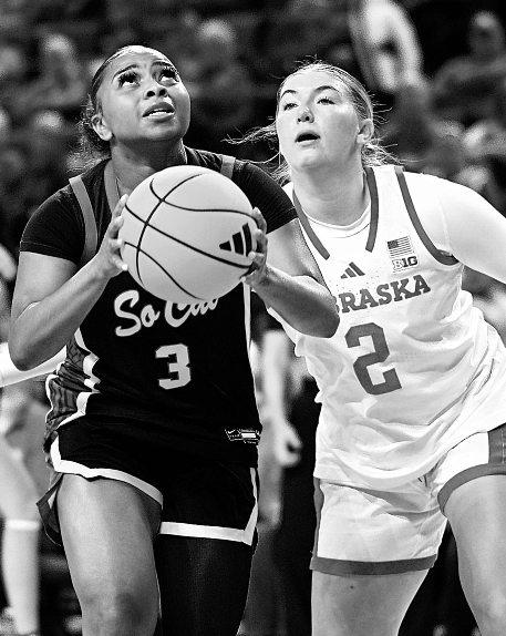 Trojans rally to defeat Huskers