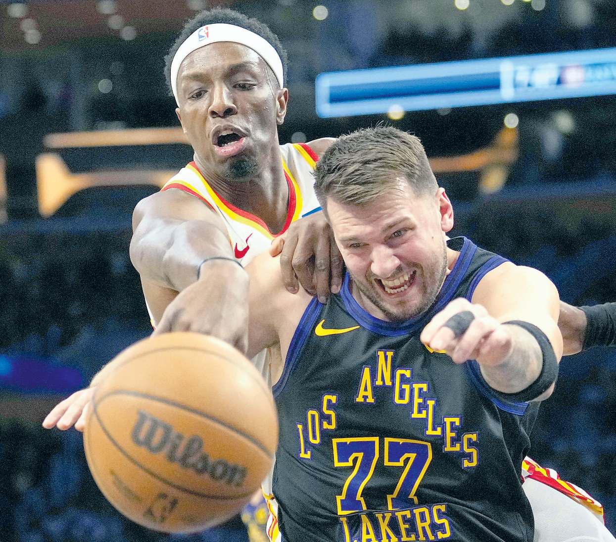Doncic, James march through Atlanta
