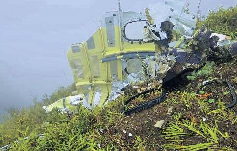 Rescuers find body near wreckage of Indonesian plane