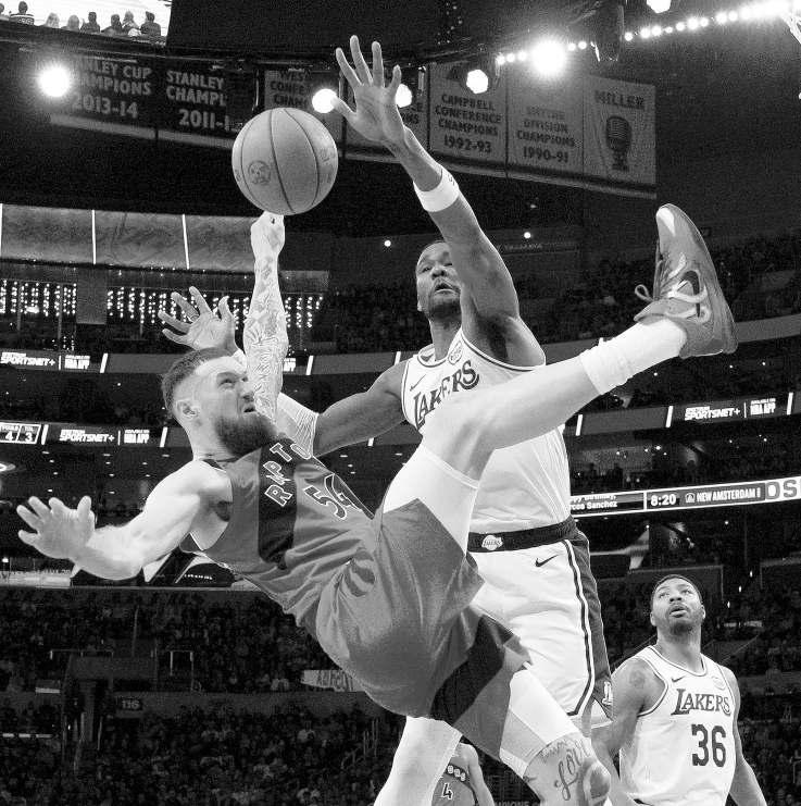 Restocked Lakers run past the Raptors