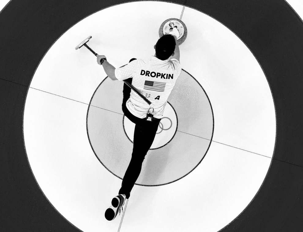 Curling duo glides into history