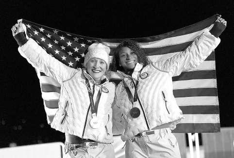 Bobsled driver rides to historic medal