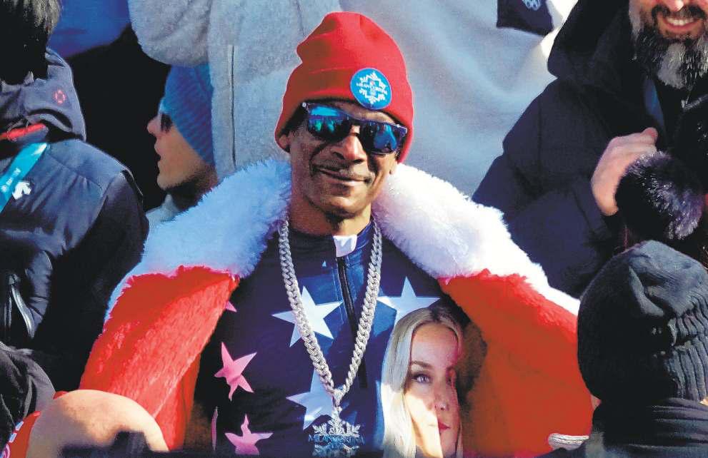 SPREADING CHEER IS RAPPER'S DELIGHT