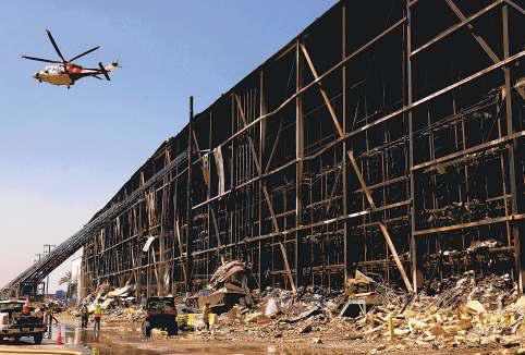 Warehouse blaze fading but health worries remain