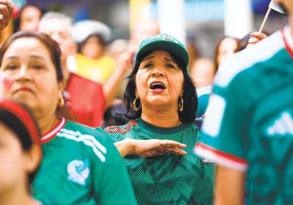 At World Cup, national anthems unite Latinos